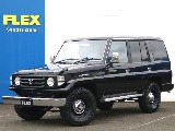 平成7年式ランドクルーザー77上級グレードZX！ノーマル車高、背面レスと派手なカスタムはない物の武骨で渋い一台が緊急入庫いたしました！