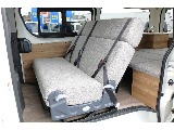 車内をウッド調インテリアで統一したキャンピングカーで 対面、フルフラットも可能♪
