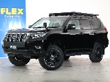 150プラド後期のTXグレードですが、ラックがつき、タイヤホイールもノーマルから変わっているライトカスタムです！