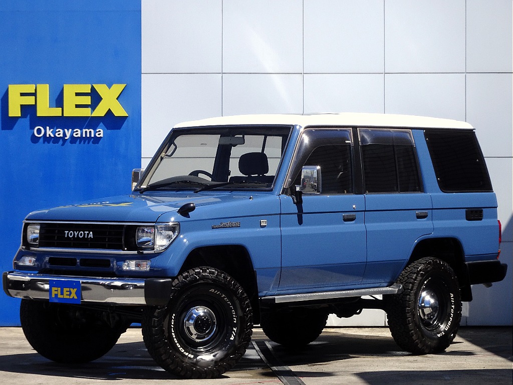 トヨタ ランドクルーザープラド プラド5ドア3.0DT EXワイド 4WD アルルブルー 2インチアップ ライトカスタム 岡山県