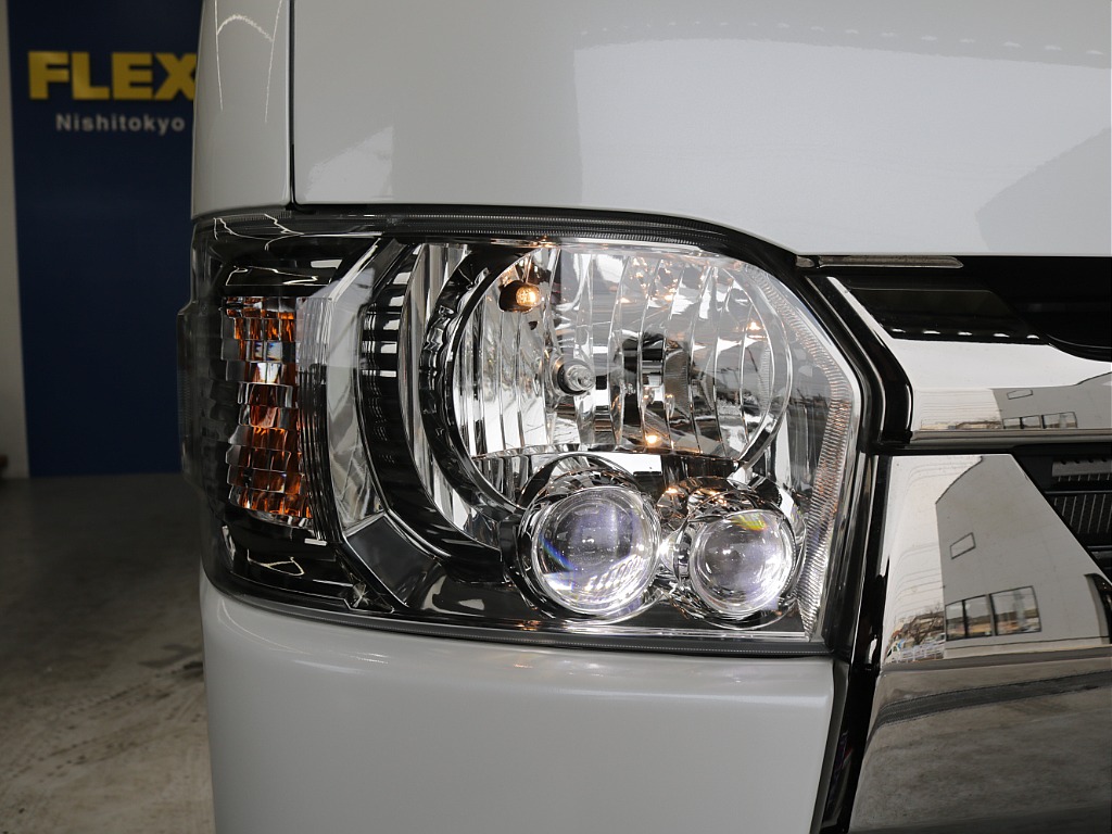 令和６年式ハイエースＶダークプライムⅡ２０００ガソリン２ＷＤカスタム車両入庫！オリジナルフロントスポイラーオリジナルオーバーフェンダーオリジナル１７インチアルミアルパインＢＩＧ－Ｘ１１インチナビ装備！