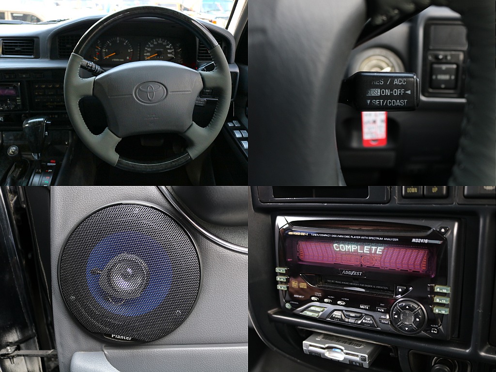 新品ウッドコンビステアリング＆新品ウッドシフトノブ。 ブラックの外装に合わせて黒ウッドを採用。